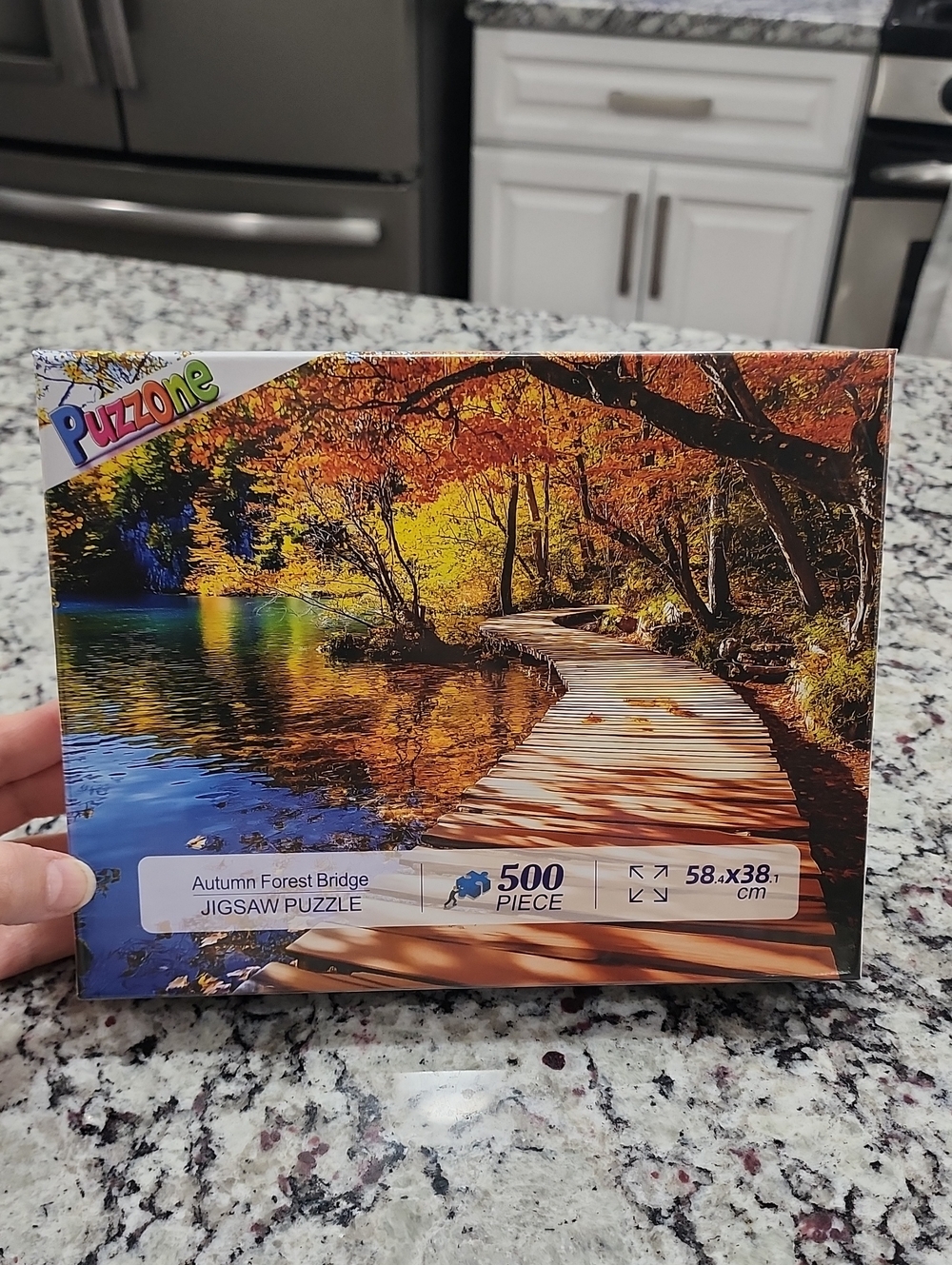 PuzzOne Autumn Forest Bridge 500-piece Jigsaw Puzzle.